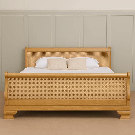 Wooden bed with wicker design against a beige wall