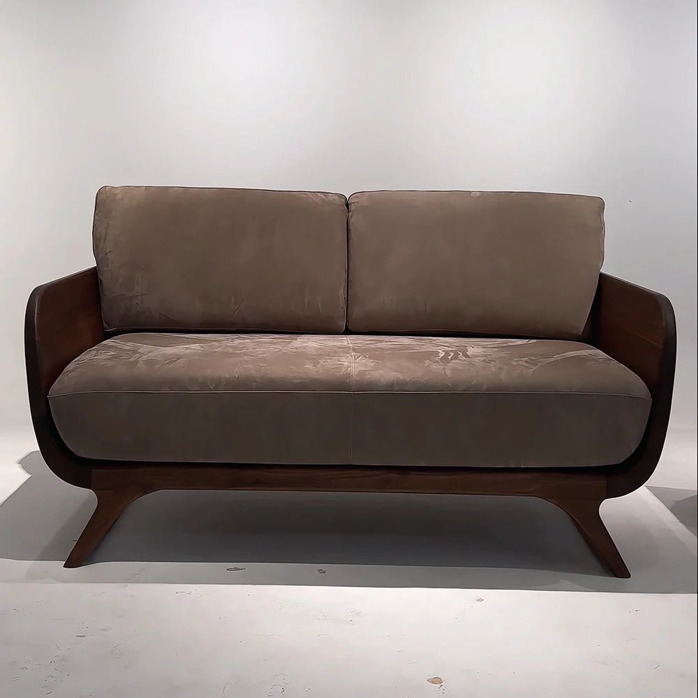 Brown sofa with wooden frame on a white background