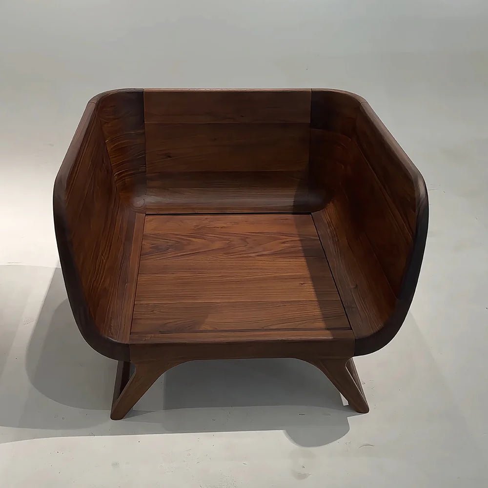Wooden armchair with a modern design on a plain background
