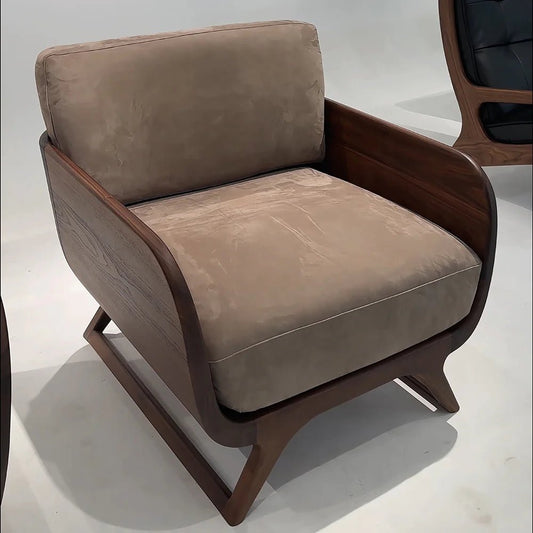 Brown armchair with wooden frame on a white background
