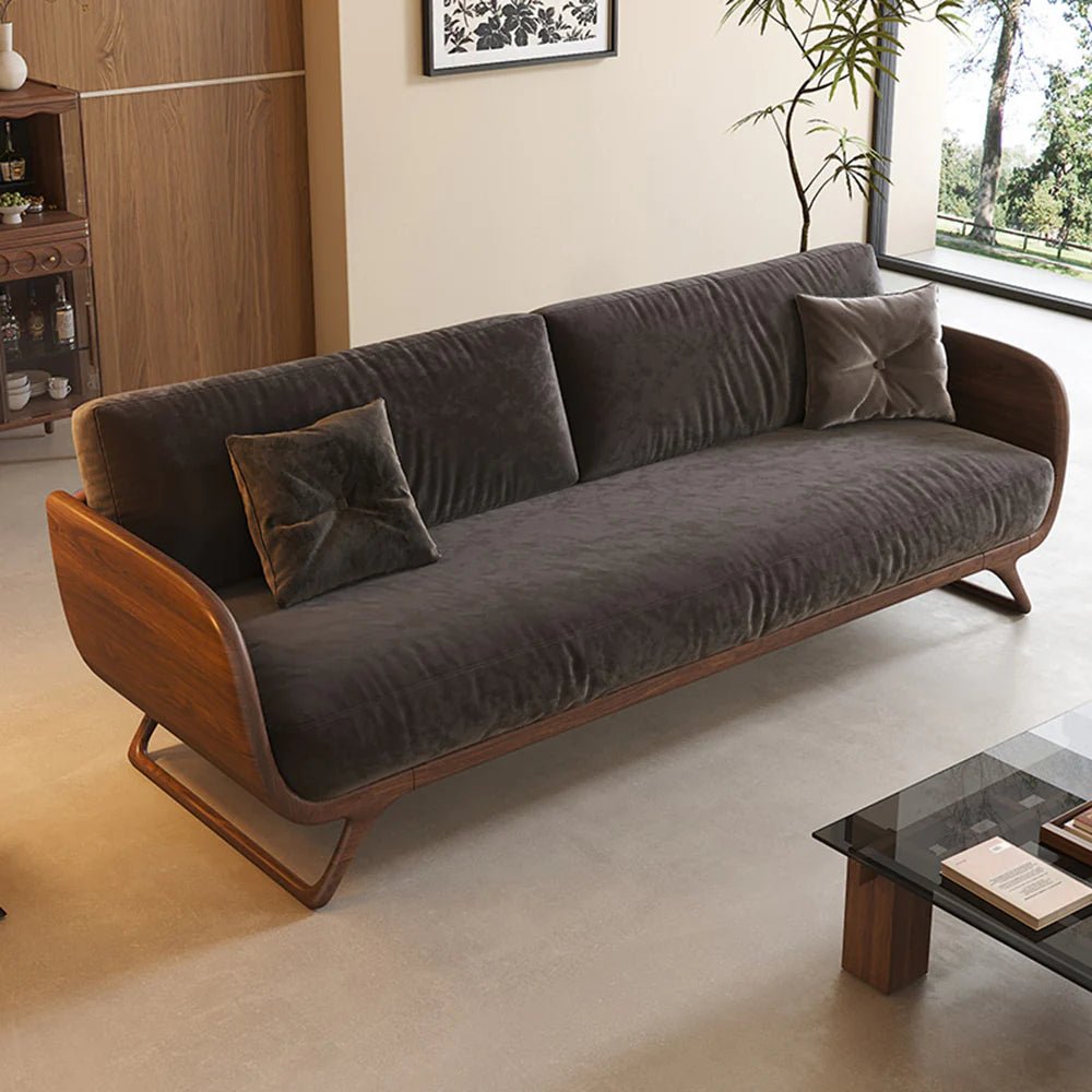 Gray sofa with wooden frame in a living room setting