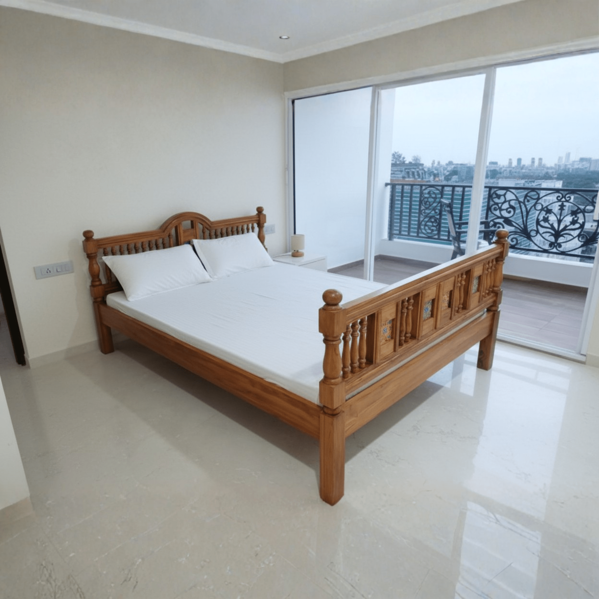 Solid teak wood bed with handcrafted spindle headboard in a modern bedroom