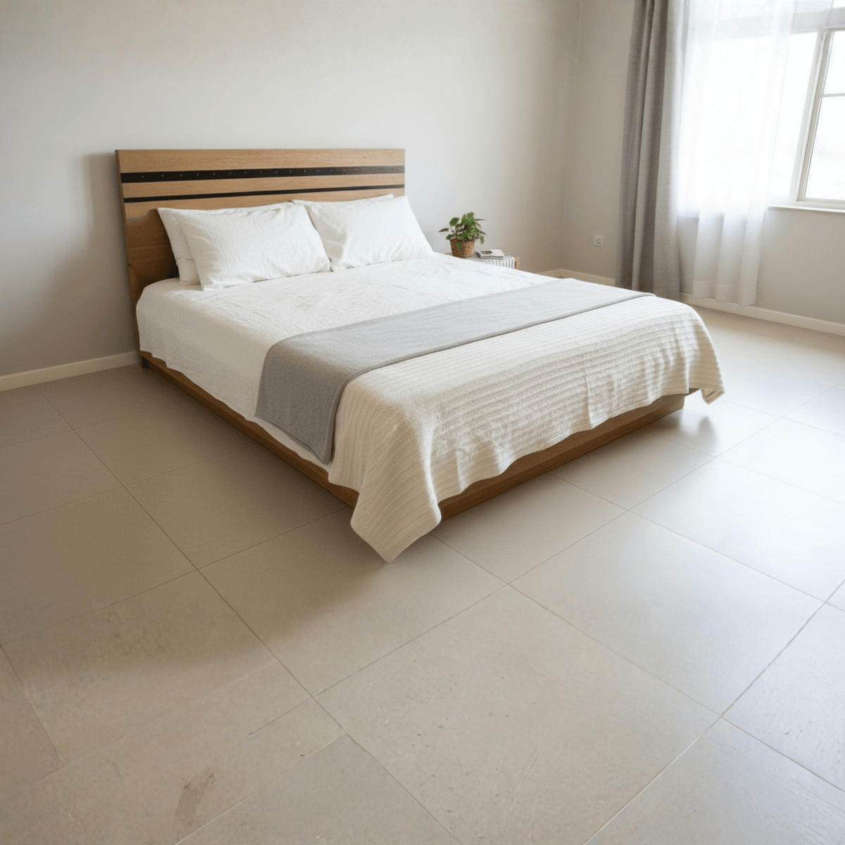 Teak wood platform bed with mattress and white bedding, modern Indian bedroom furniture design