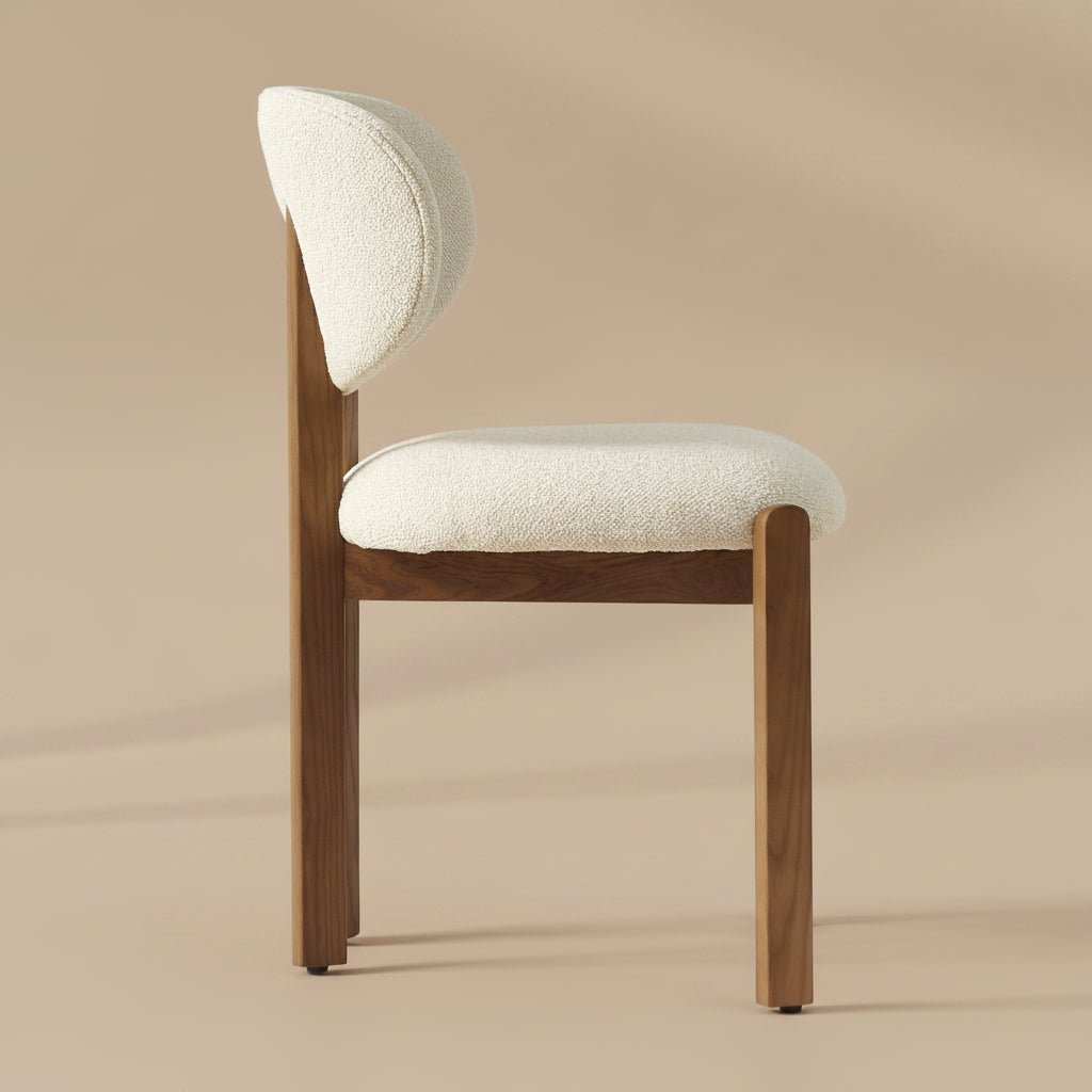 solid teak dining chair with rounded upholstered backrest and cushioned seat
