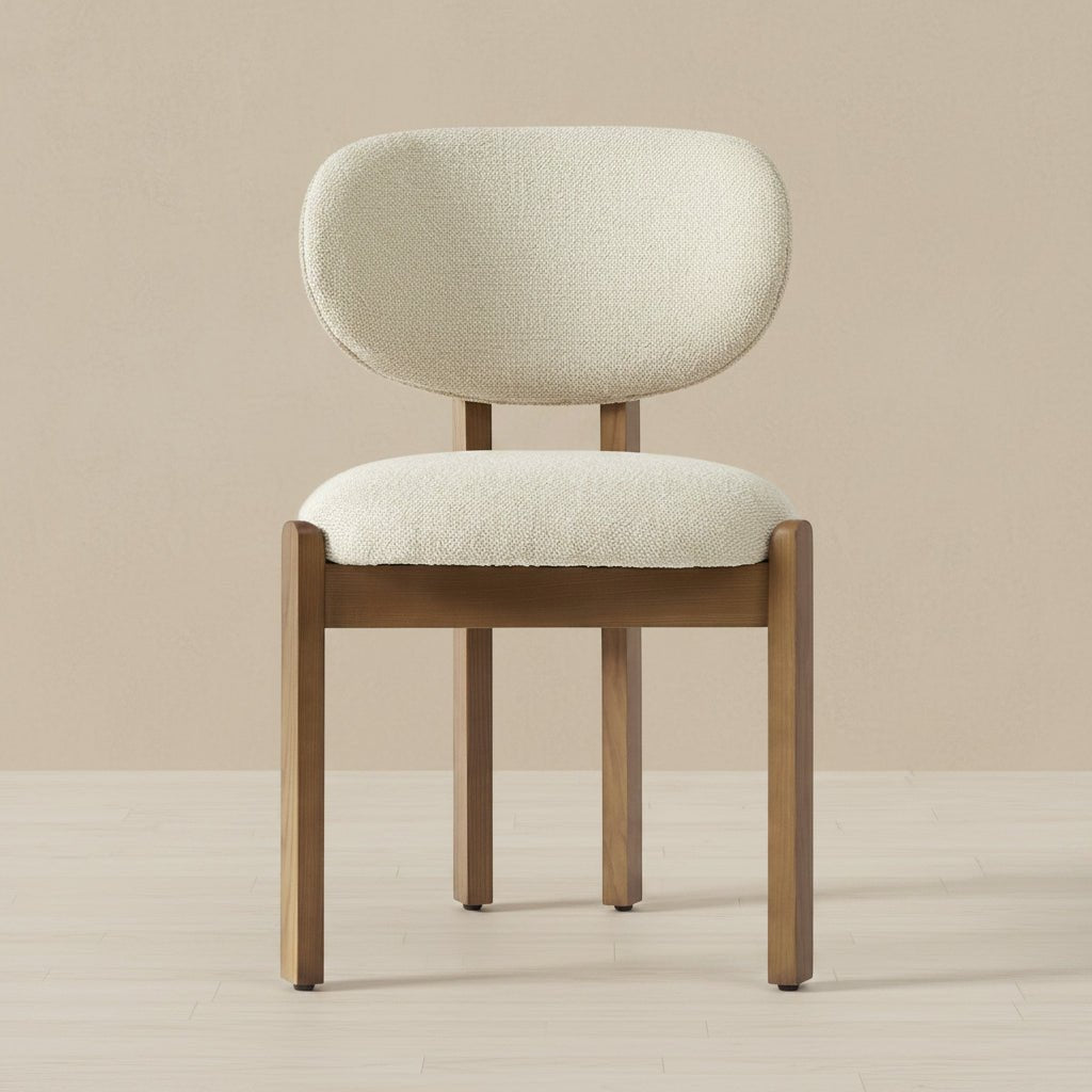 solid teak dining chair with rounded upholstered backrest and cushioned seat