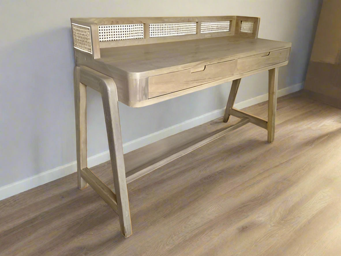 Minimalist wooden desk made of teak with curved legs and cane detailing