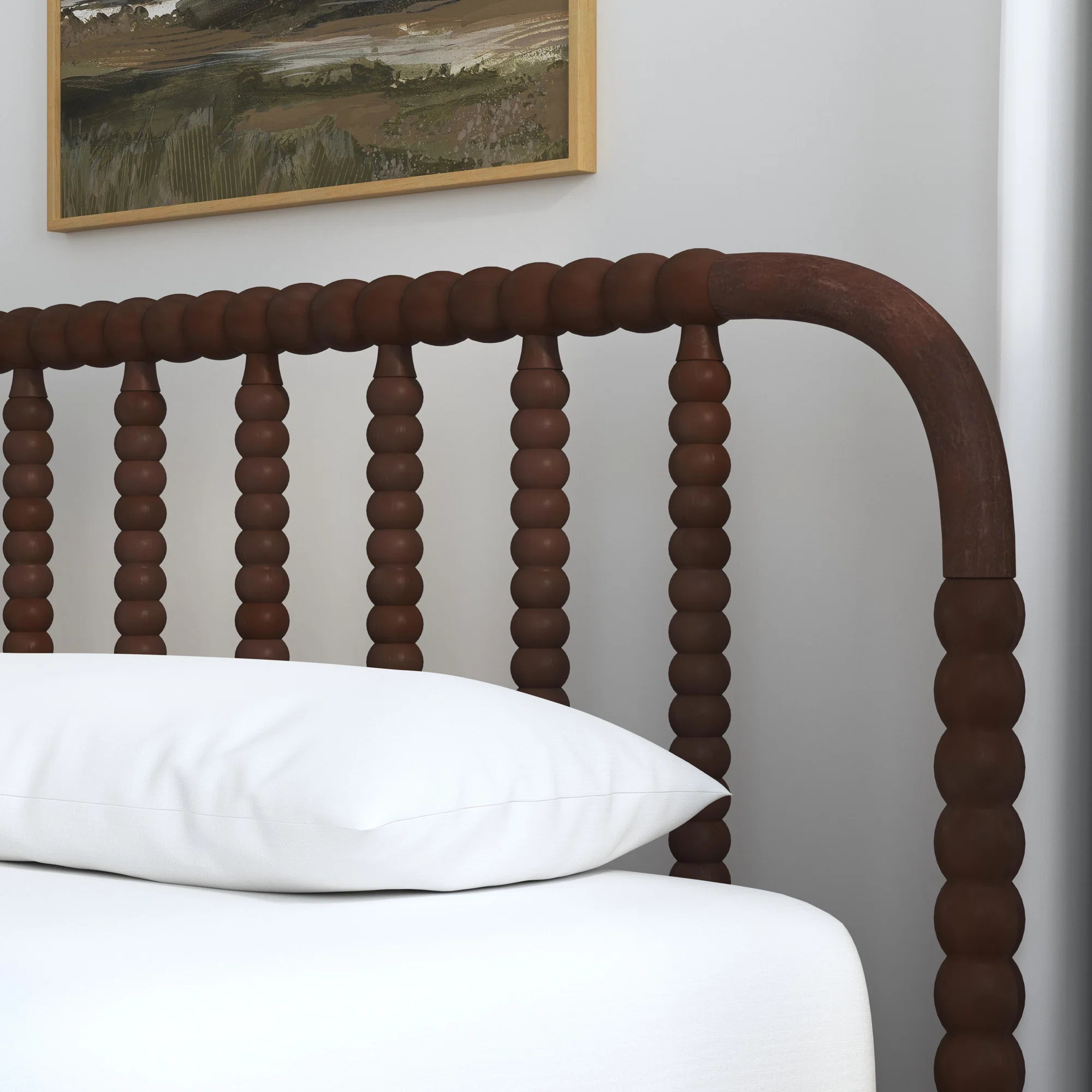 Close-up of handcrafted teak wood spindle bed headboard detail