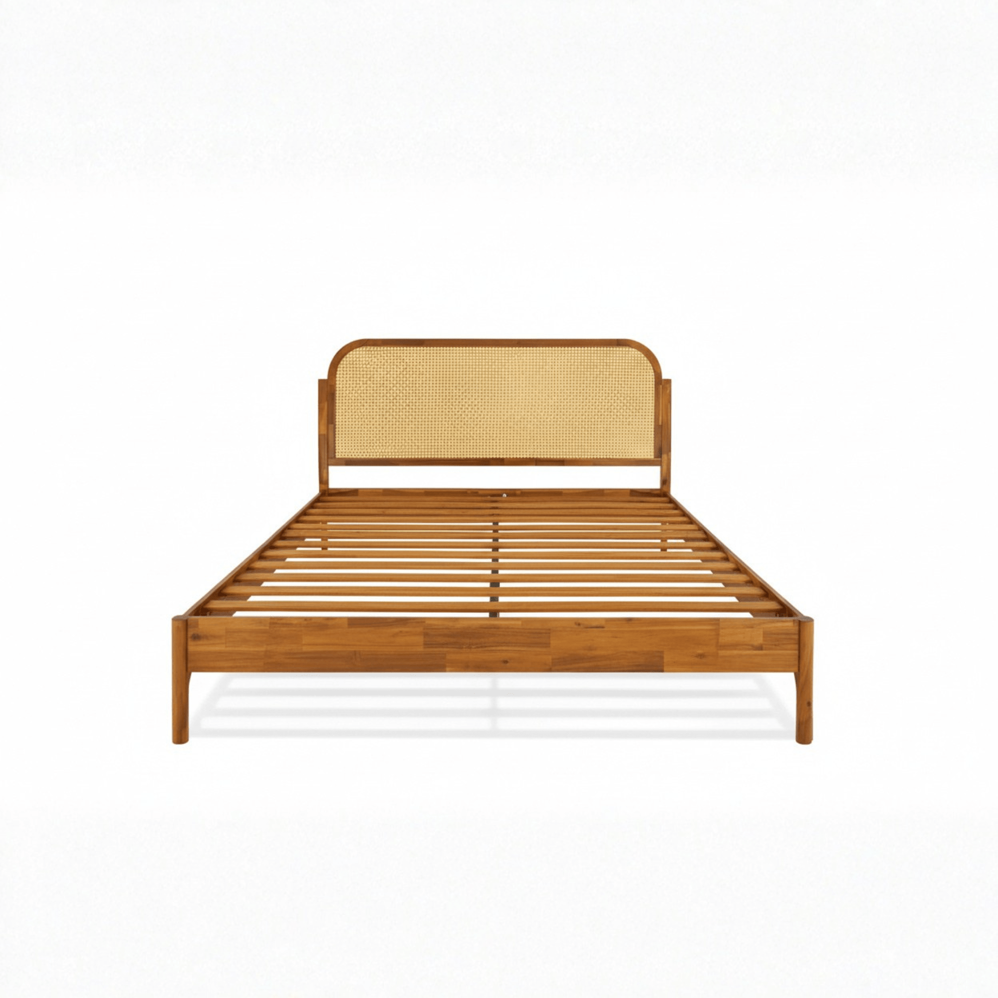 Front view of teak wood cane bed showing wooden slat mattress support