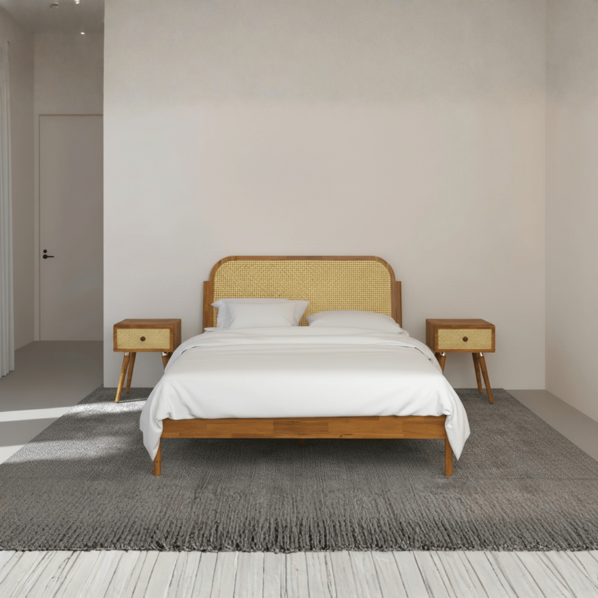 Front view of teak wood cane bed with sleigh headboard in king size bedroom setting