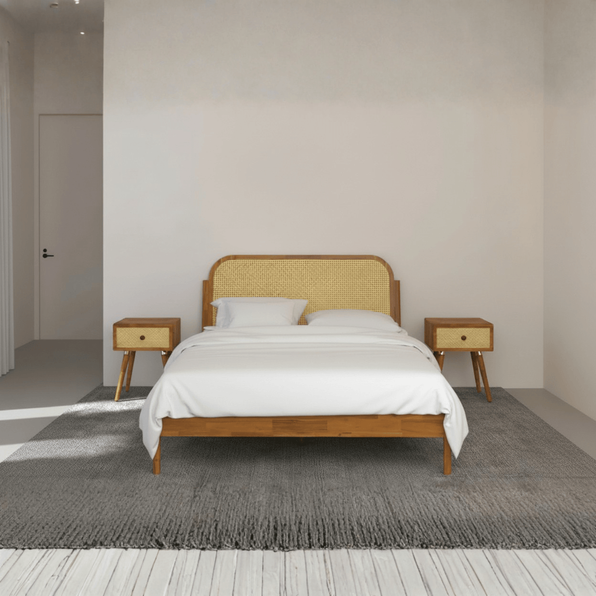 Front view of teak wood cane bed with sleigh headboard in king size bedroom setting