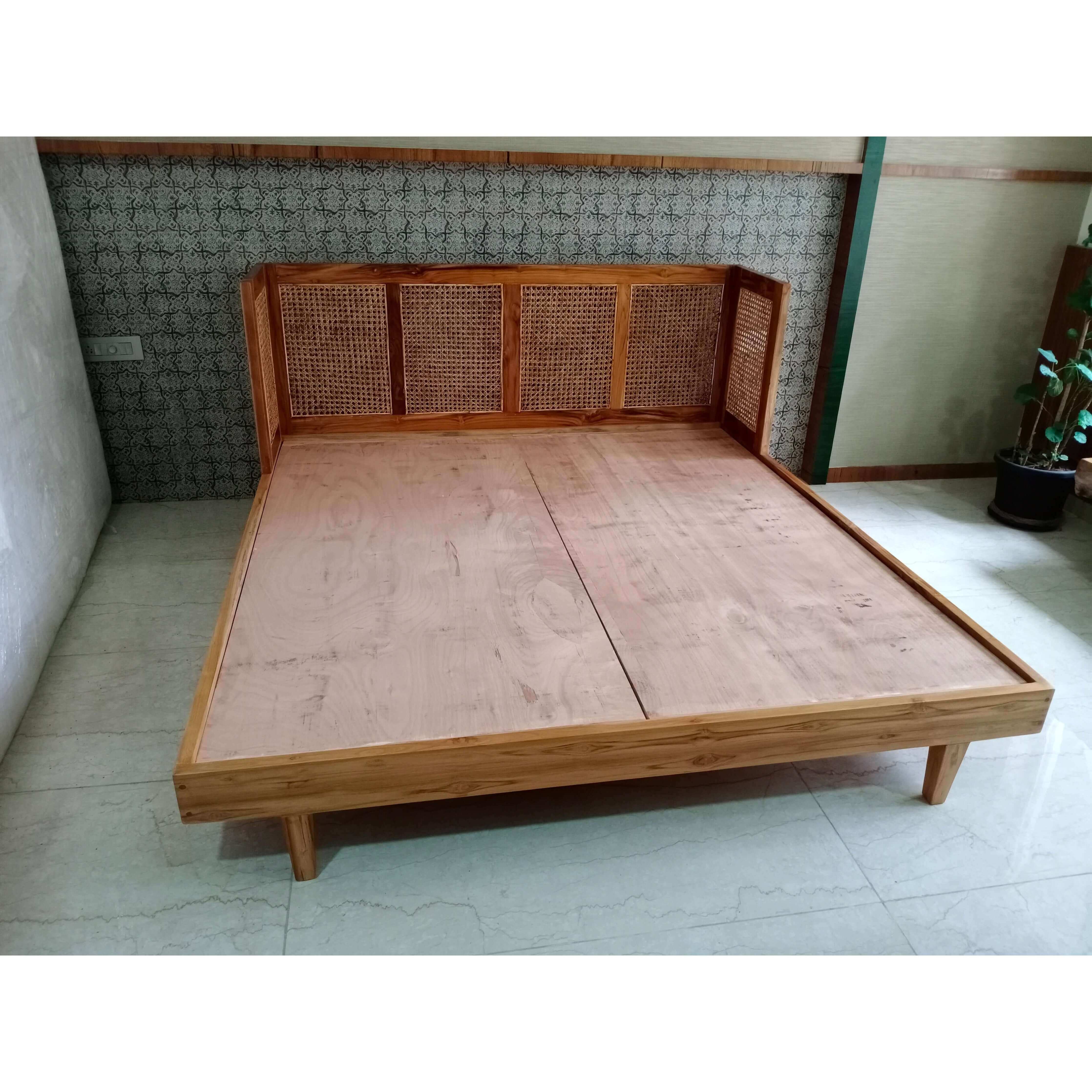 Rattan Wicker headboard teak wood bed with natural cane webbing on headboard.