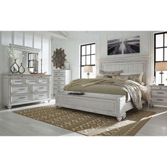 Wooden bedroom set with storage bench attached and painted in white
